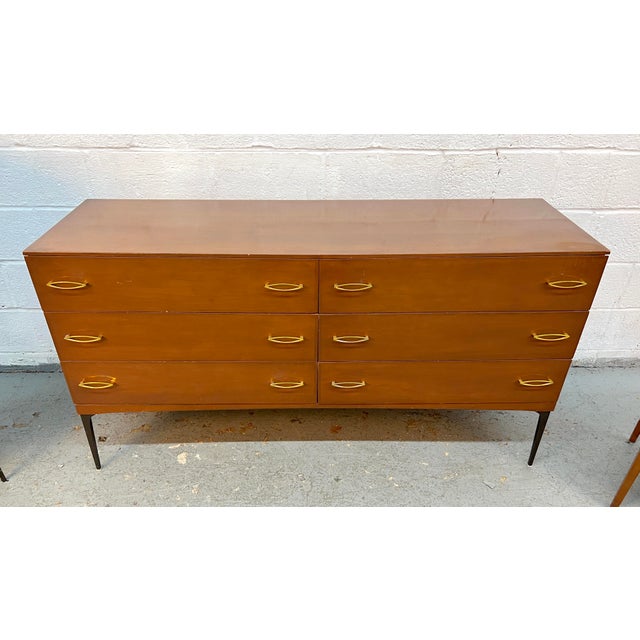 An exceptional 1960s Heywood-Wakefield Contessa Series lowboy dresser, showcasing the sophisticated lines and outstanding...