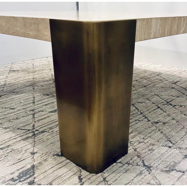 Original retail $5055, stylish Revelation Modern Travertine Caress Cocktail Table, brass legs, showroom floor sample