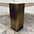 Original retail $5055, stylish Revelation Modern Travertine Caress Cocktail Table, brass legs, showroom floor sample