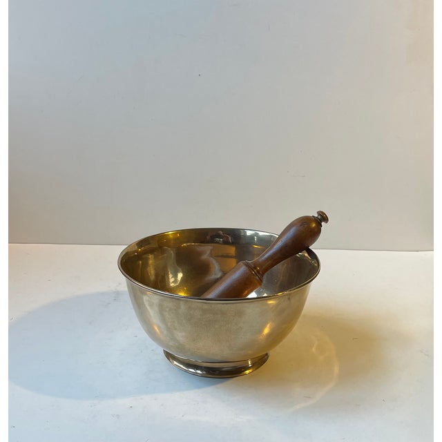 Asian Buddhist singing bowl in spun polished bronze. The bowl was made in India or Nepal circa 1950-70. It is accompanied...