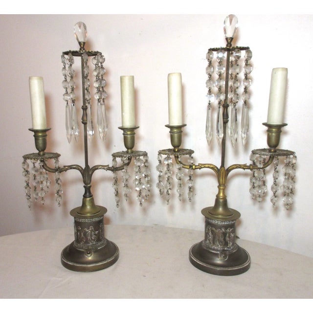 Up for sale is a very high quality pair of E.F. Caldwell gilt bronze and crystal electric table lamps. they are done with...