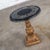 Awesome neoclassic or Hollywood Regency round side table or end table comprised of a gilded plaster pedestal base and...