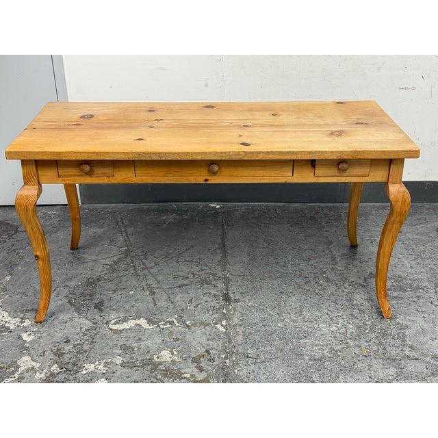 Design Plus Gallery presents a Pine Dining Table or Writing Desk in a Farmhouse Style. The piece is so pleasant with...