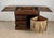 Early 20th century Spanish sewing cabinet crafted in solid oak with a warm rustic patina and highly functional interior....