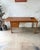 Vintage 1960s Danish modern teak desk by Løvig, stamped Løvig Dansk Design / Made in Denmark. Professionally refinished by...