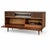 A sleek and beautifully proportioned mid-century Grundig radiogram, combining rich walnut-toned cabinetry with striking...