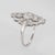 Finely detailed vintage Art Deco diamond ring (circa 1920s to 1930s) crafted in 900 platinum. Old mine cut diamonds total...