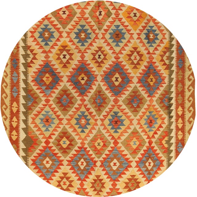 Beautiful Contemporary Kilim Rug, hand-knotted wool with a multi color field in an allover geometric design. This rug...