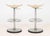 Pair of Etienne Fermigier (French, 1932-1973) for Mirima "Reaper" Adjustable Bar Stools, with white lacquered metal seats...
