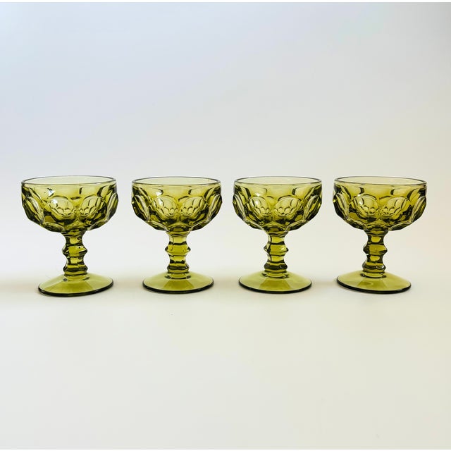 A set of 4 gorgeous coupe glasses in green glass. Made in the "Provincial" pattern by Imperial Glass of Ohio between 1966...