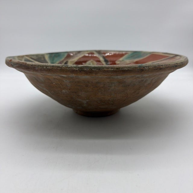 19th Century Spanish Glazed Terracotta Lebrillo Bowl with Swirling Leaf Motif - 11" An authentic 19th-century Spanish...