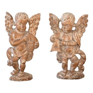 Pair of 17th Century Carved Cherubs on Stands For Sale
