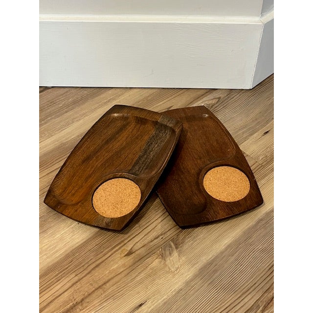 Set of vintage mid-century modern serving trays made of solid walnut, manufactured in Japan during the 1970s. The trays...