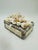 This is a vintage shell trinket box, a decorative piece often collected as a seaside souvenir or keepsake. Form &...