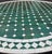 Beautiful handcrafted Moroccan mosaic table featuring an elegant hunter green and white color palette. Measuring 40 inches...