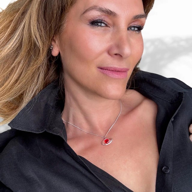 Red Evil Eye Pendant Positive Energy Sterling Silver Necklace is a captivating blend of symbolic protection and timeless...