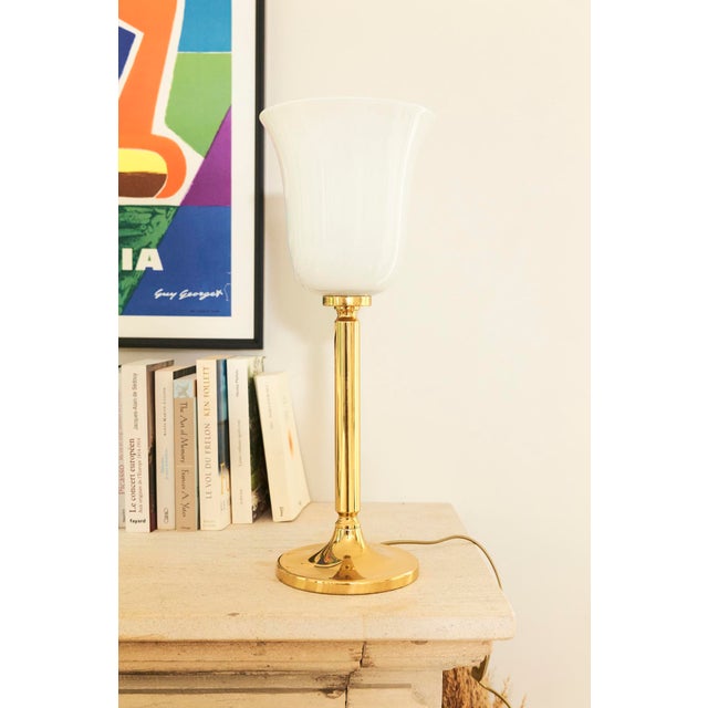 Brass base and opaline glass lampshade. In excellent condition - slight signs of wear to the brass. 60s. Electrical...