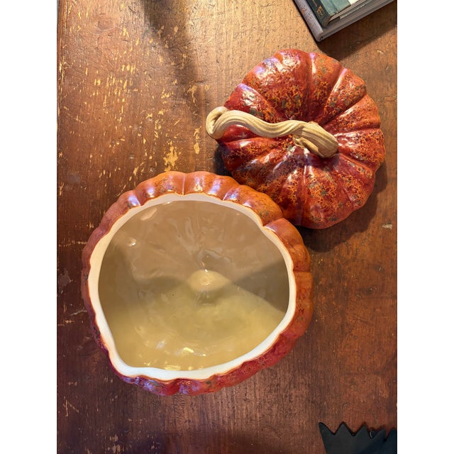 The PATRICIA GARRETT Studio Pottery Pumpkin Tureen with Lid is a handmade, vintage piece of dinnerware that perfectly...