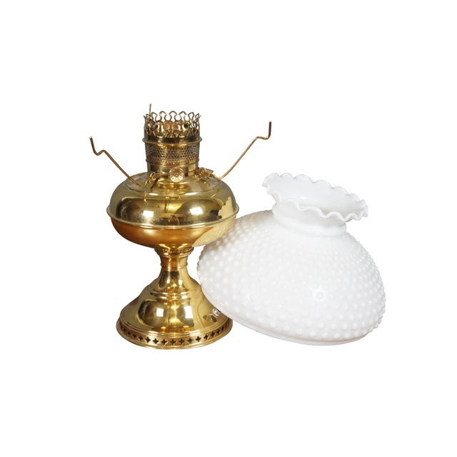 Late 19th-early 20th century Bradley & Hubbard brass oil lamp with cross pierced base and hobnail milk glass globe / shade...