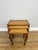 An elegant Vintage French Louis nest of three tables , featuring graceful shaped tops, decorative carved edging and...