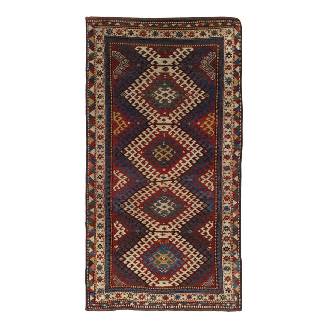 Antique Kazak Handmade Wool Geometric Gold, Ivory, Navy & Light Blue Rug For Sale