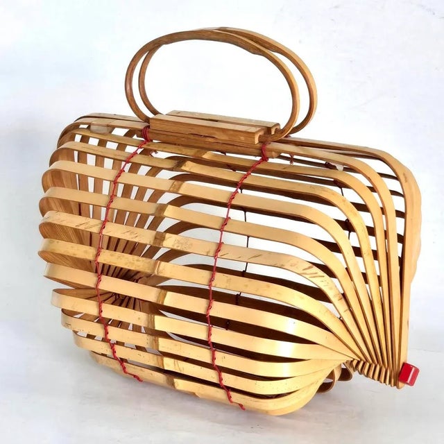 Offered is a rare 1940s-1950s Japanese "Lobster Cage" basket purse. While there is genius engineering in the artisan...