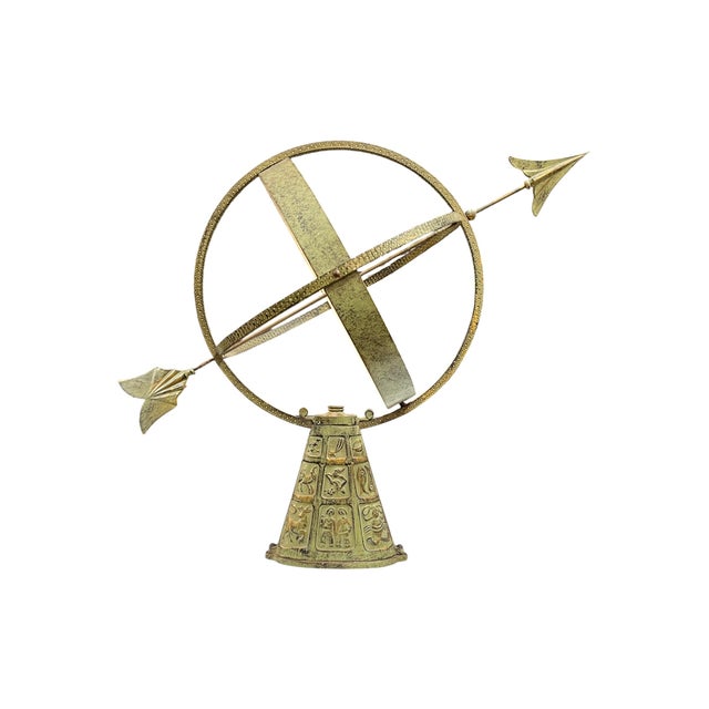 Bronze armillary with verdigris patina measuring 25 1/4 inches tall and 16 1/4 inches in diameter, with base depicting...