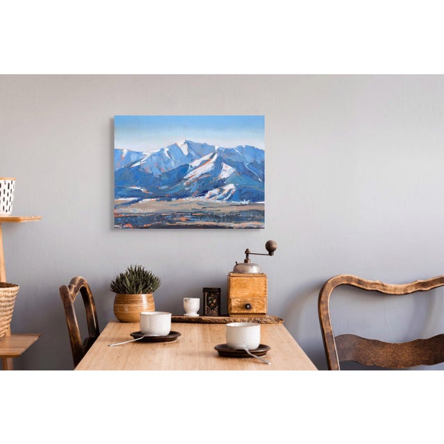 The painting captures the majestic Sangre de Cristo Range, showcasing bold, sweeping brushstrokes that convey the rugged...