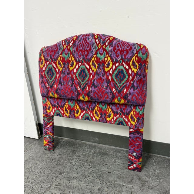 Design Plus Gallery presents a Bespoke Twin Size Ikat Upholstered Headboard. The arched profile is upholstered in a vivid...