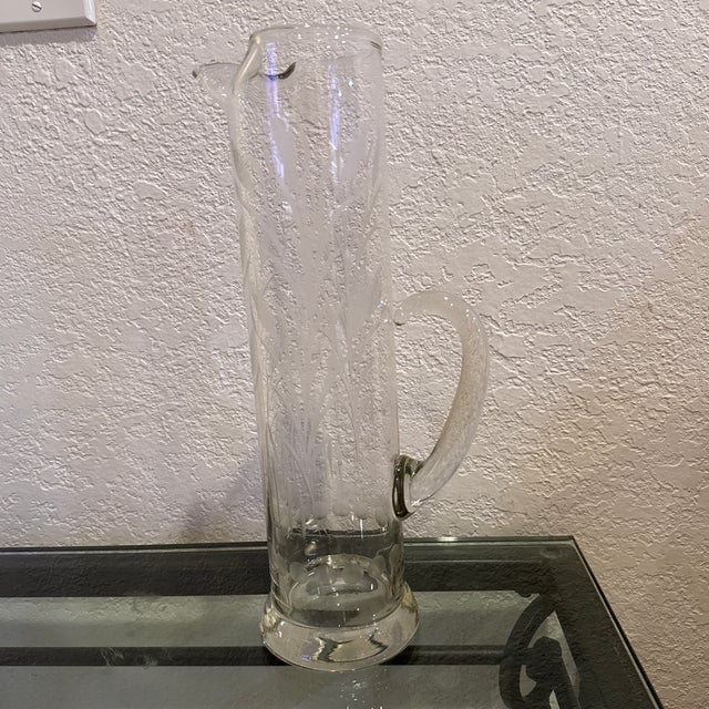 Hard to find mid- Century engraved glass martini pitcher by Javit. This is a large martini Pitcher in their Fine wheat...