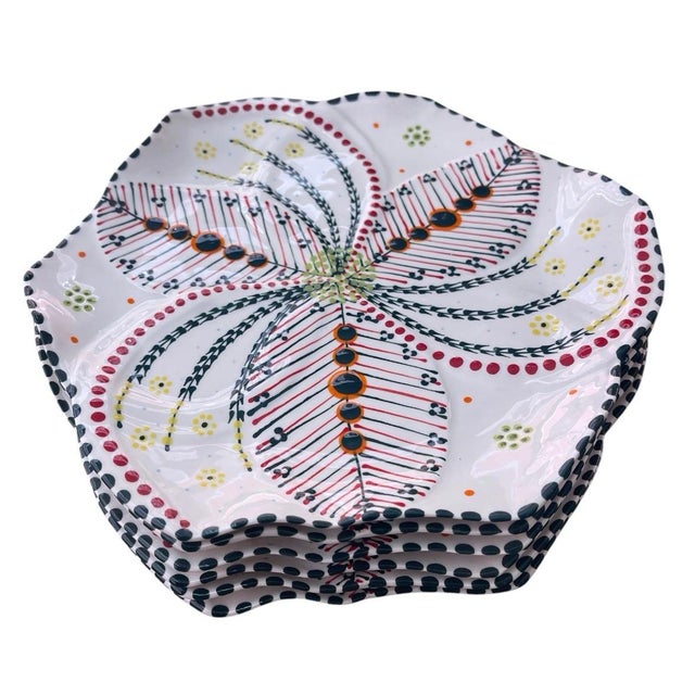 An exquisite and highly stylized vintage set of six artisanal pottery plates, handmade and meticulously hand-painted in...