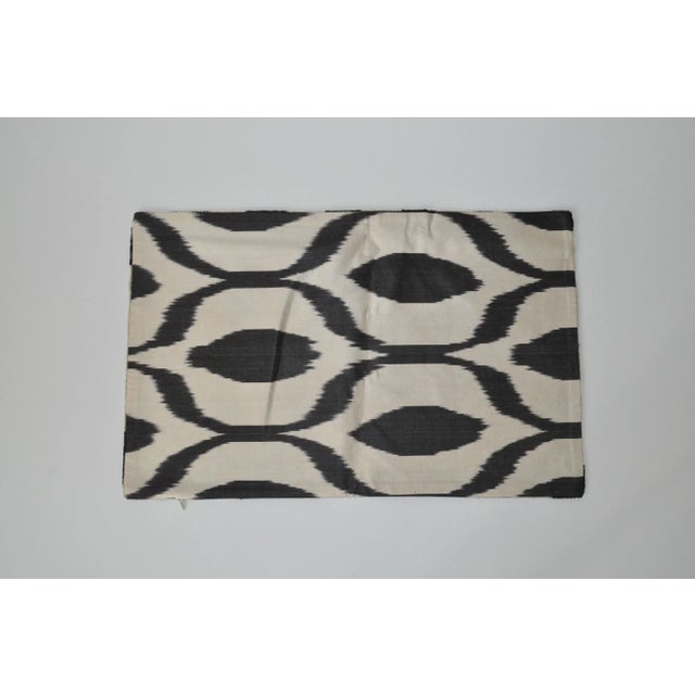 Beautiful black and white geometric silk velvet accent pillow with a different silk design on the back. It's like getting...