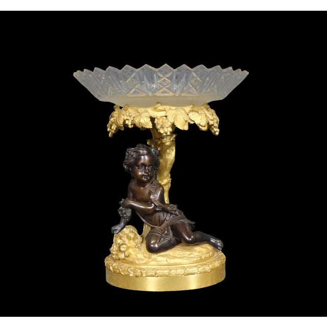 Introduce timeless European elegance to your interior with this exquisite bronze and crystal centerpiece, a masterfully...