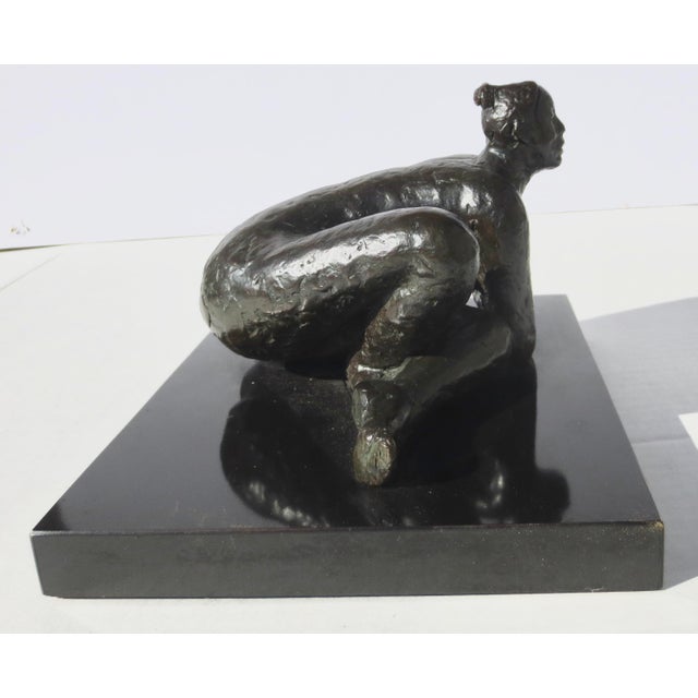 Small female nude in polished Bronze by New York Sculptor Bobby Margolis. Margolis worked from the female form in many of...