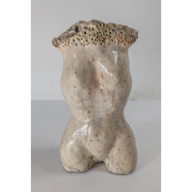 We are selling this cool mid-century modern art pottery torso. This female figure is abstractly and simply modeled in off...