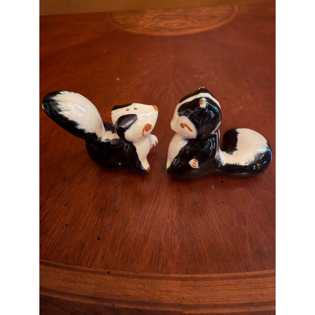 The Vintage Robert Simmons Ceramics from Los Angles, Ca Skunk Figurines Pewey and Pewette from the 1950s are decorative...