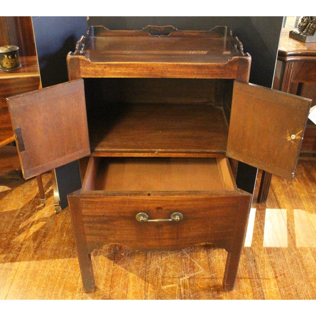 Circa 1765-1780 George III period bedside commode table, English. Gallery top with square legs. Undulating gallery with 3...