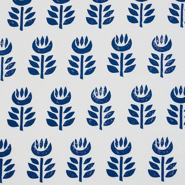 Screen printed on a linen ground, this simple, stylized tulip design has the perfectly imperfect look of a hand block...