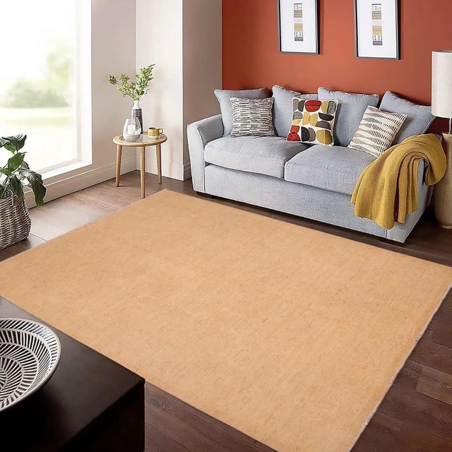 "Enhance the ambiance of your home with this magnificent Persian-influenced Turkish hand-knotted rug made by skilled...