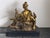 A finely detailed late-19th-century French bronze figural group by Adrien Étienne Gaudez (French, 1845–1902), depicting a...