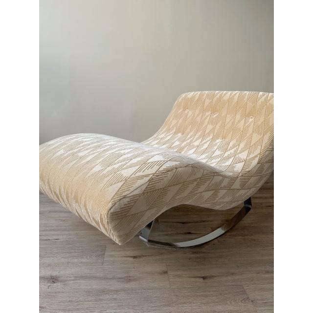 Model 1264 rocking chaise designed by Adrian Pearsall for Craft Associates. The armless form features a continuous,...
