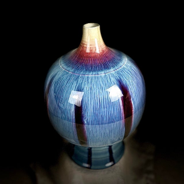 Bring dramatic color and exceptional scale to your interior with this striking vintage Chinese flambé art pottery vase....