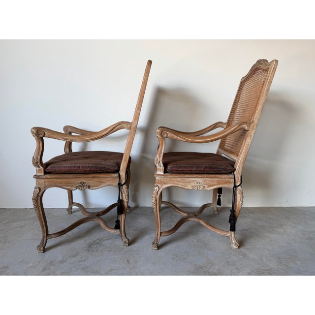 Vintage Hollywood Regency Louis XV-Style Carved Wood & Cane Armchairs – A Pair For Sale - Image 4 of 13
