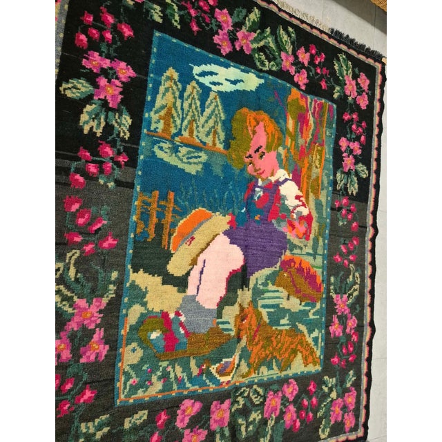 This authentic hand-woven Anatolian kilim is a rare find, estimated to be between 80 and 90 years old. It represents a...