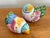 Pair of Fitz and Floyd salt and pepper shakers, with a patchwork of colors and patterns. Charming and appealing Folk Art...
