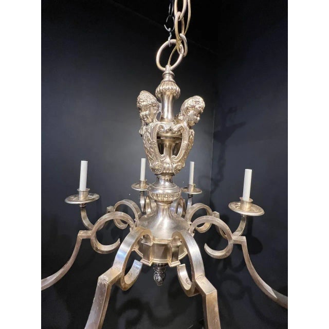 A circa 1900’s Caldwell silver plated chandelier with cherubs atop.