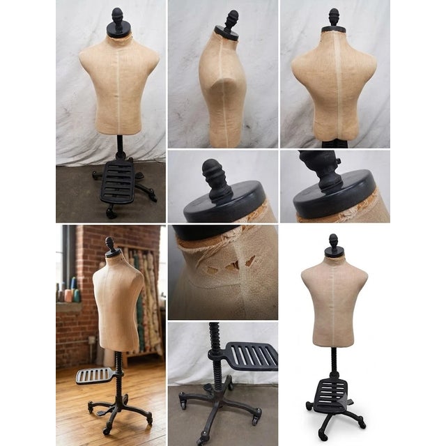 An impressive mid-20th-century industrial tailor's dress form mannequin with a heavy cast-iron base, mechanical foot...