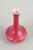 Kähler, vase. Slim-necked vase with a rounded body and a rare deep red glaze showing subtle tonal variation. Executed in...