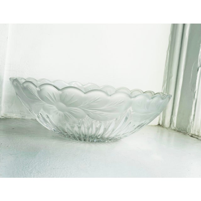 This vintage Lausitzer crystal bowl from Germany (GDR) is made of 24% lead crystal. The bowl features a scalloped rim with...