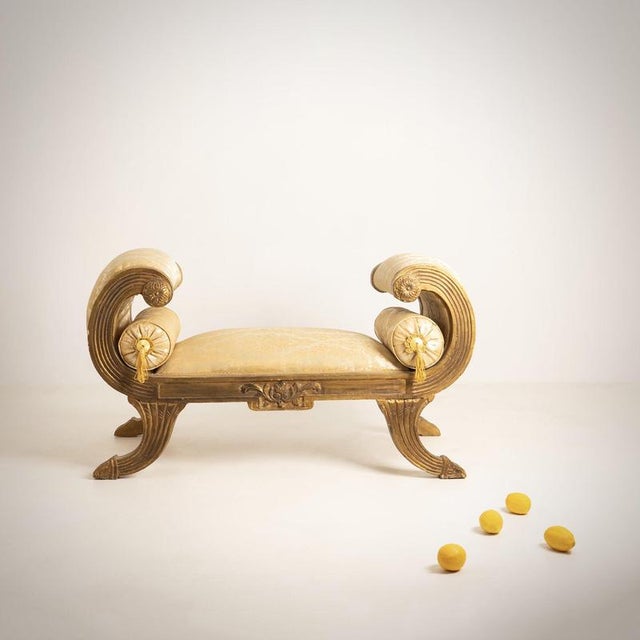BAROQUE Roman bench, France, late 18th century. Carved and gilded wood, patterned fabric. Height 70 cm (seat 42 cm)....